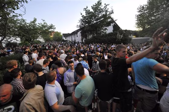 Party goers gather in Hamburg, German after a teenage girl, identified only as Thessa, forgot to mark her birthday invitation as private on Facebook. 